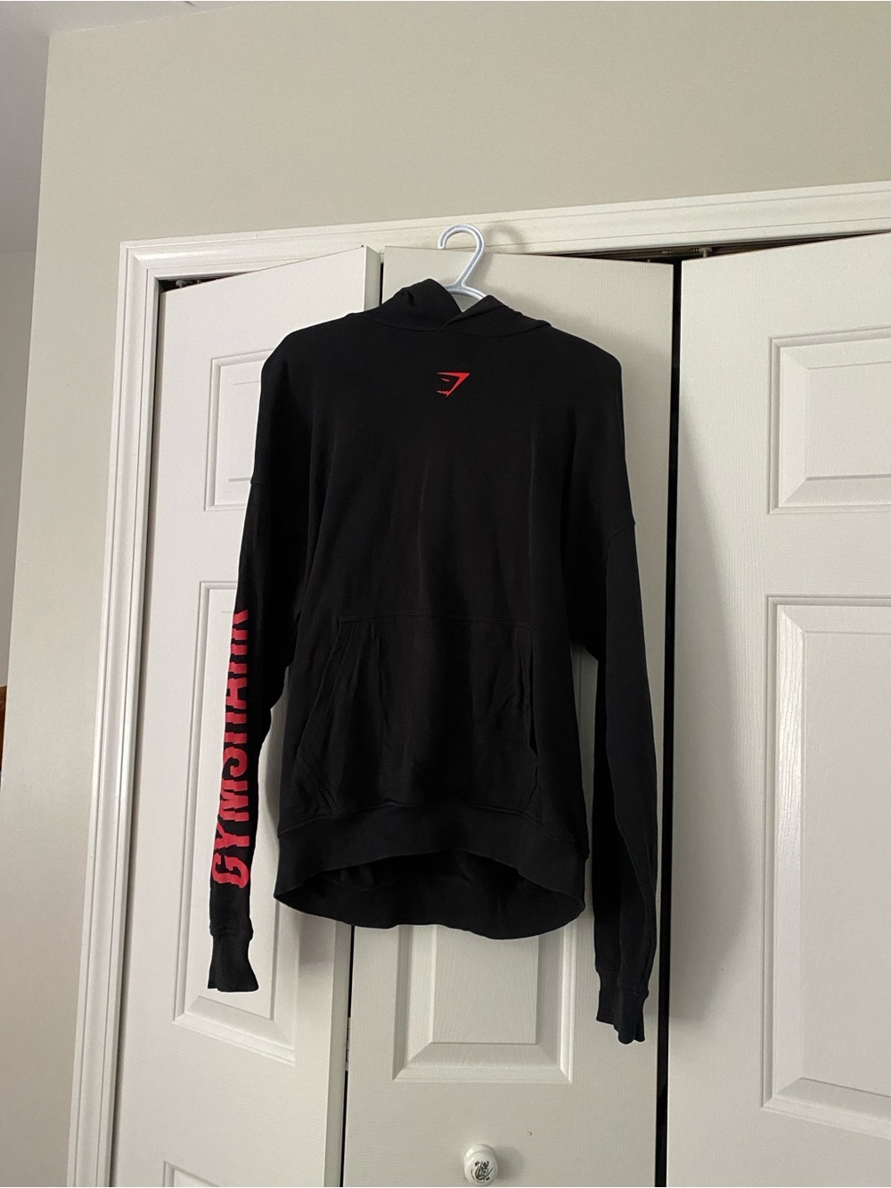 Gymshark Black Hoodie with Red Logo